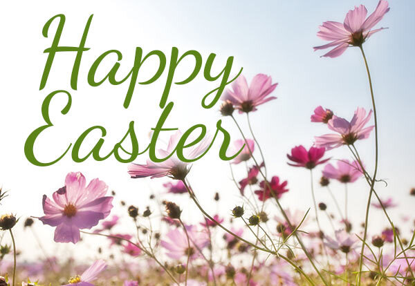 Happy Easter. Written on a background of colorful flowers.
