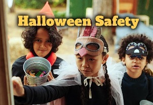 Halloween Safety, with three children trick or treating in the distance.
